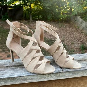 Beige /cream colored strappy heels. Very pretty, great condition.Heel 3”.